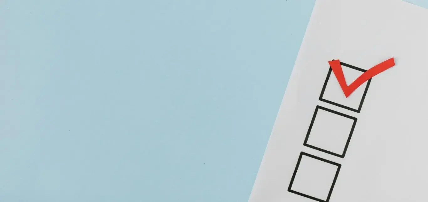 A checklist with one box checked against a light blue background.
